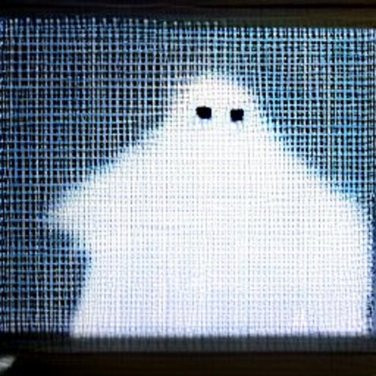 Ghost behind a computer screen